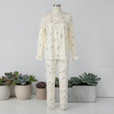 Ivory ribbon print PJ set displayed on mannequin - front view