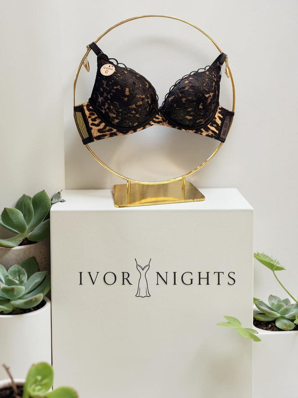 Ivory Nights imported black lace bra with leopard print band and gold accents