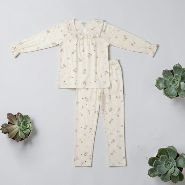 Ivory ribbon print PJ set laid flat - top and trousers