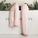 Pink floral print satin pyjama set by Ivory Nights - side detail view