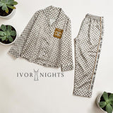 Double C monogram houndstooth satin pyjama set by Ivory Nights - flat lay